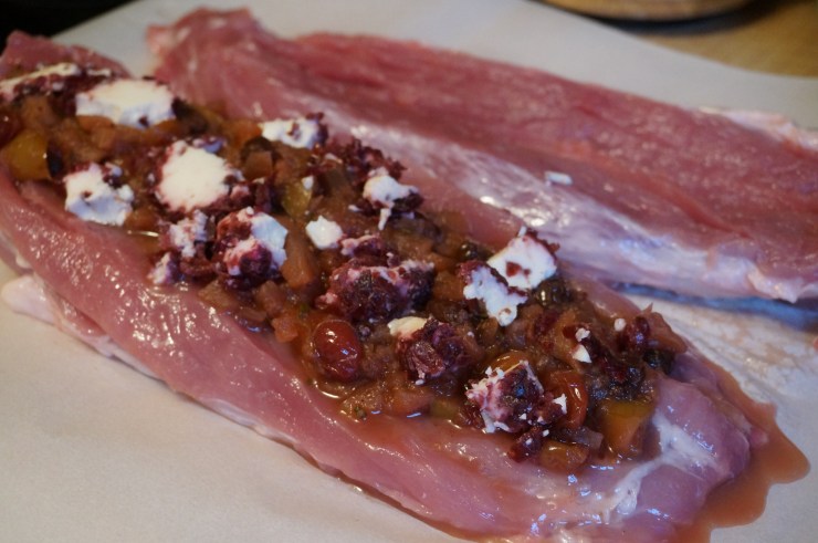 Spread salsa and goat cheese on pork.