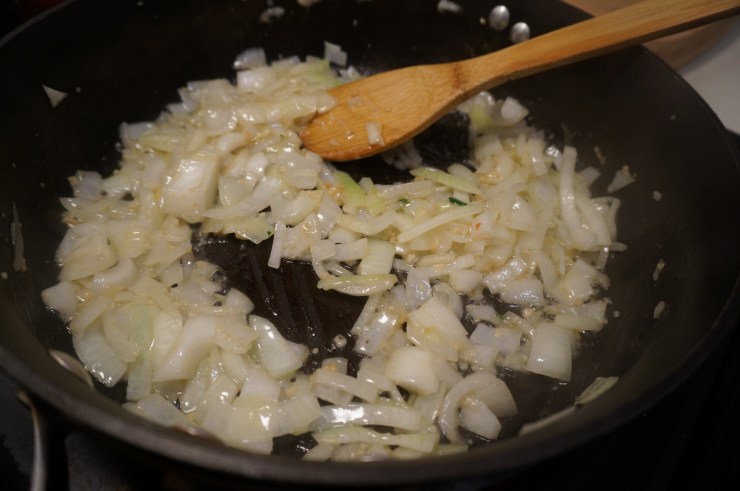 Cook onions and garlic.