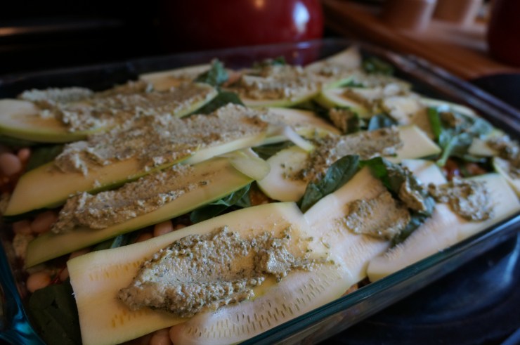 Layer more zucchini noodles on top.